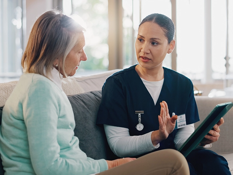 woman talking with another woman